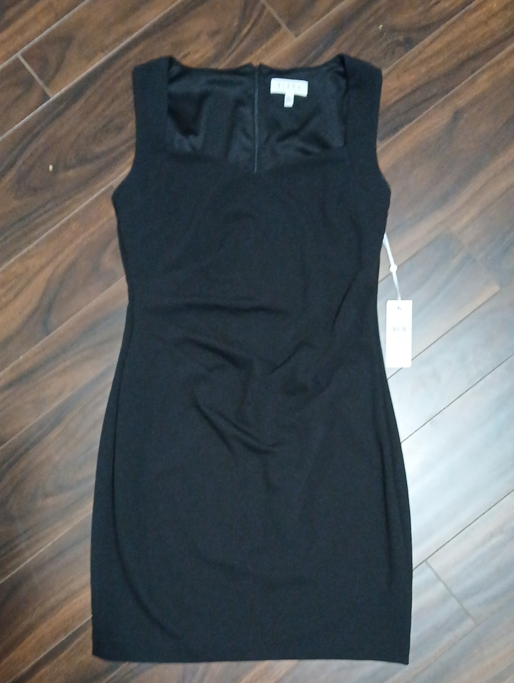Classic Black Sleeveless Sheath Dress